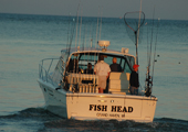 Charter Fishing Boat Heading into Lake Michigan